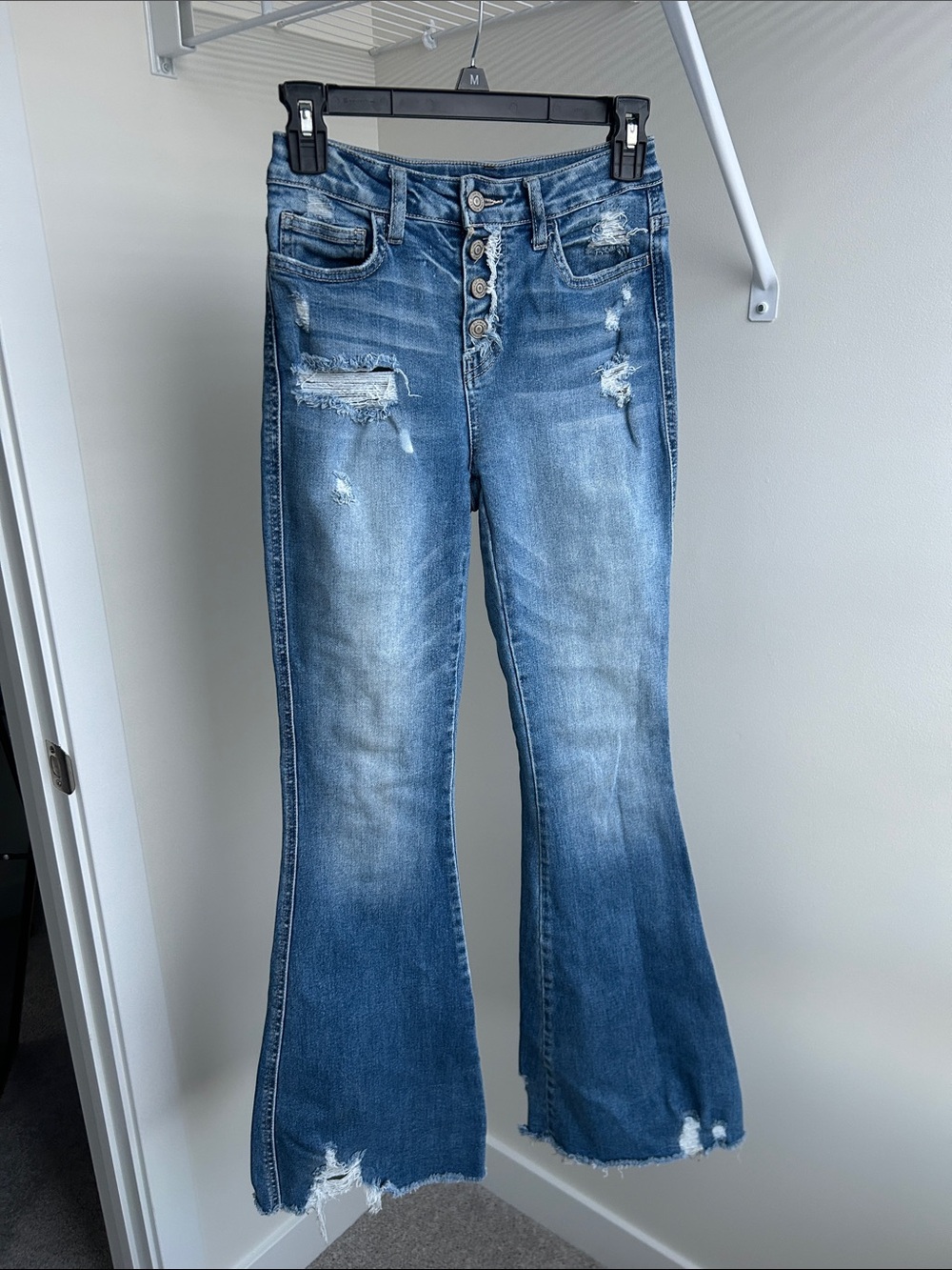High-Rise Distressed Flared Jeans - Blue